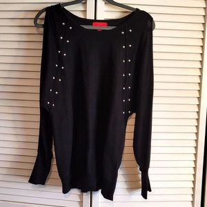 Jennifer Lopez cold shoulder sweater